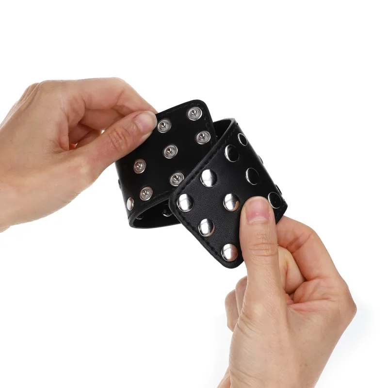 Kink - Wrist Restraints With Snap Fasten Full Of Rivets Black Adjustable 19-24 Cm X 5.5 Cm 1